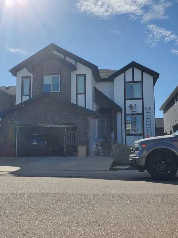 Exterior painting and stucco project by Life Saver Painting in Calgary, AB